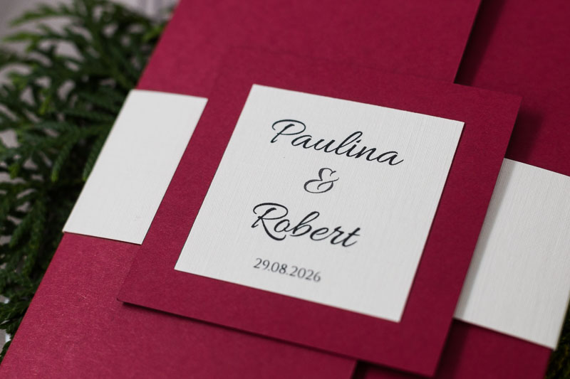 Zaproszenia na ślub folder z opaską i imionami Młodej Pary